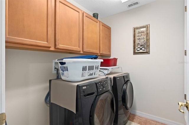 920 Nola Dr, Ocoee, FL 34761 - laundry room featuring independent washer and dryer, cabinet space, tile patterned flooring, and a desk