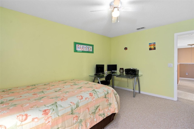 920 Nola Dr, Ocoee, FL 34761 - carpeted bedroom with baseboards and ceiling fan