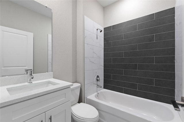 full bathroom with  shower combination, toilet, and vanity