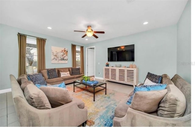 living area with baseboards, tile patterned flooring, recessed lighting, and a ceiling fan