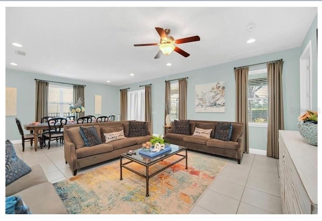 living area featuring visible vents, ceiling fan, recessed lighting, and light tile patterned floors