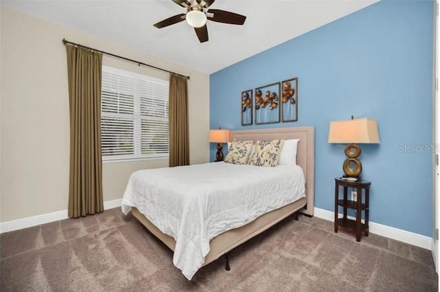 bedroom featuring carpet flooring, a ceiling fan, and baseboards