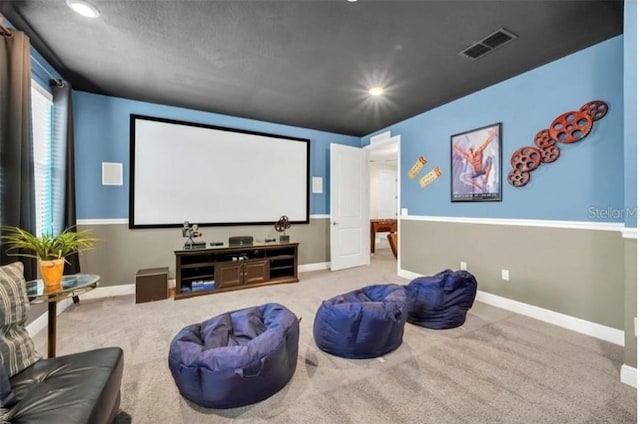 home theater featuring carpet flooring, recessed lighting, baseboards, and visible vents