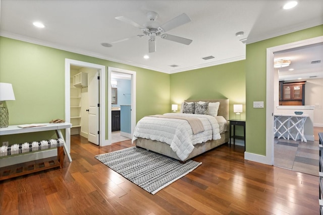 7849 Georgeann St, Winter Park, FL 32792 - bedroom featuring ornamental molding, hardwood / wood-style floors, baseboards, a ceiling fan, and recessed lighting
