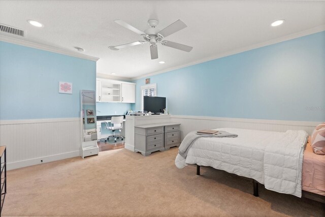 7849 Georgeann St, Winter Park, FL 32792 - bedroom with wainscoting, ornamental molding, light colored carpet, recessed lighting, and a ceiling fan