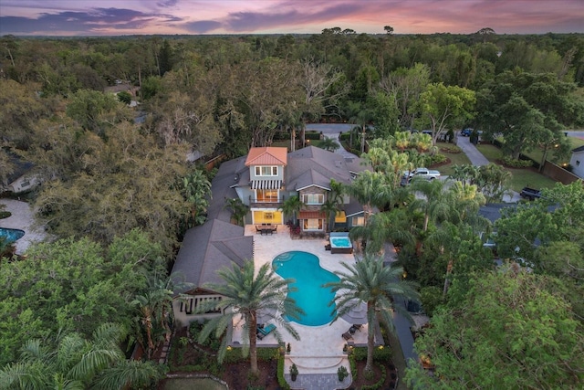7849 Georgeann St, Winter Park, FL 32792 - aerial view of property's location featuring a forest and a pool area