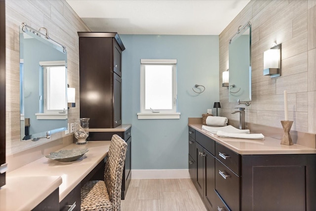 7849 Georgeann St, Winter Park, FL 32792 - bathroom featuring vanity and baseboards