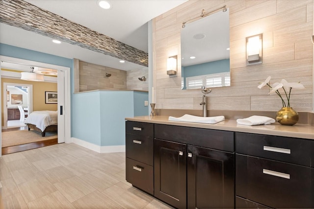 7849 Georgeann St, Winter Park, FL 32792 - ensuite bathroom featuring a walk in shower, vanity, and recessed lighting