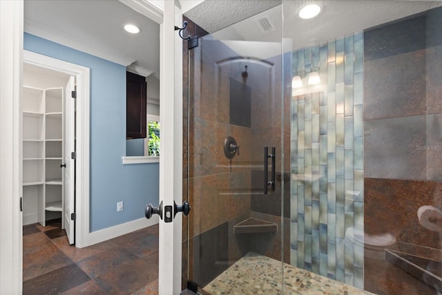 7849 Georgeann St, Winter Park, FL 32792 - full bath with a shower stall, baseboards, a walk in closet, recessed lighting, and french doors