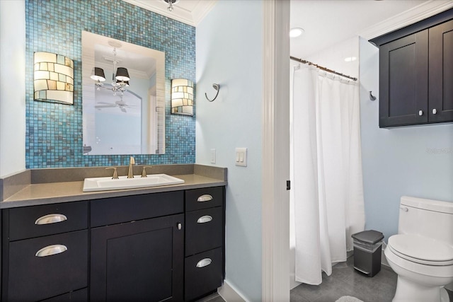 7849 Georgeann St, Winter Park, FL 32792 - bathroom featuring ornamental molding, toilet, ceiling fan, baseboards, and vanity
