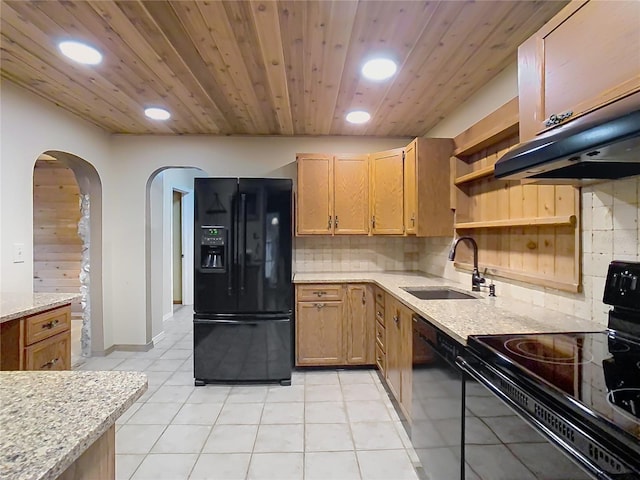 410 Sandspur Rd N, Maitland, FL 32751 - kitchen featuring tasteful backsplash, recessed lighting, a sink, arched walkways, and black appliances