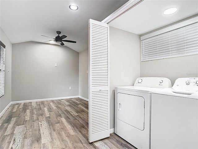 410 Sandspur Rd N, Maitland, FL 32751 - laundry room featuring washer and clothes dryer, baseboards, ceiling fan, light wood-style flooring, and laundry area