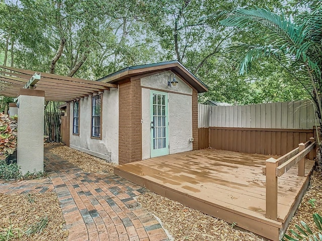 410 Sandspur Rd N, Maitland, FL 32751 - view of outdoor structure featuring a pergola, an outbuilding, and fence