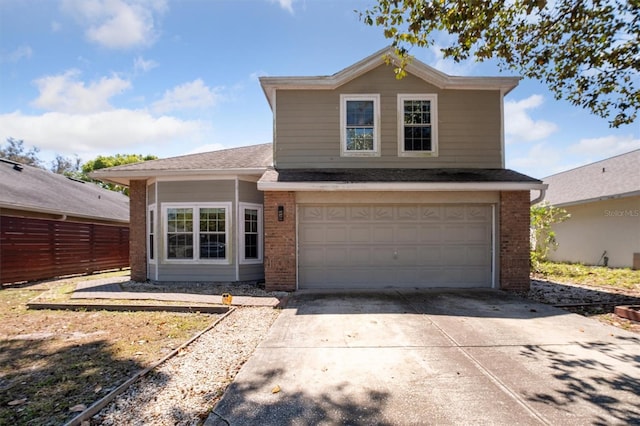 10724 Harkwood Blvd, Orlando, FL 32817 - traditional-style house with a garage, fence, brick siding, driveway, and roof with shingles