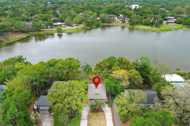 birds eye view of property featuring a water view