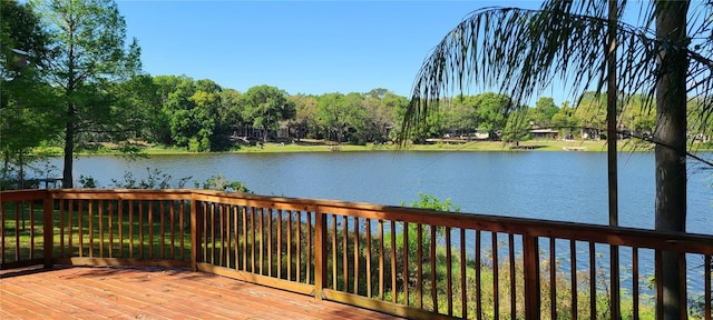 wooden deck with a water view