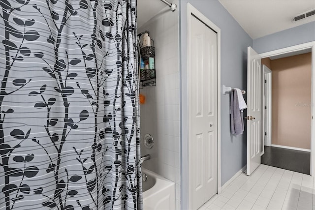 618 Via Milano, Apopka, FL 32712 - bathroom featuring baseboards, shower / bathtub combination with curtain, and visible vents