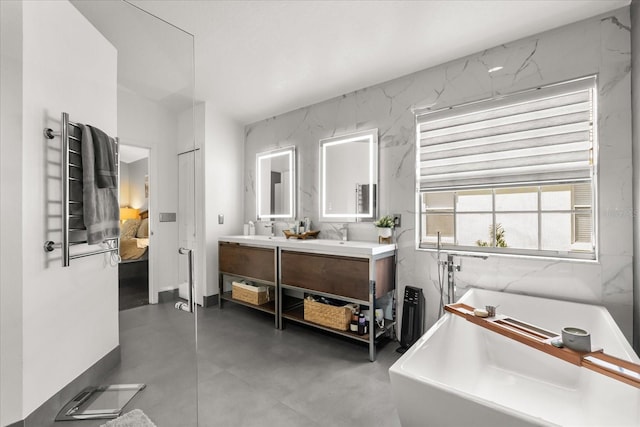 618 Via Milano, Apopka, FL 32712 - ensuite bathroom with a sink, a freestanding bath, double vanity, and ensuite bathroom