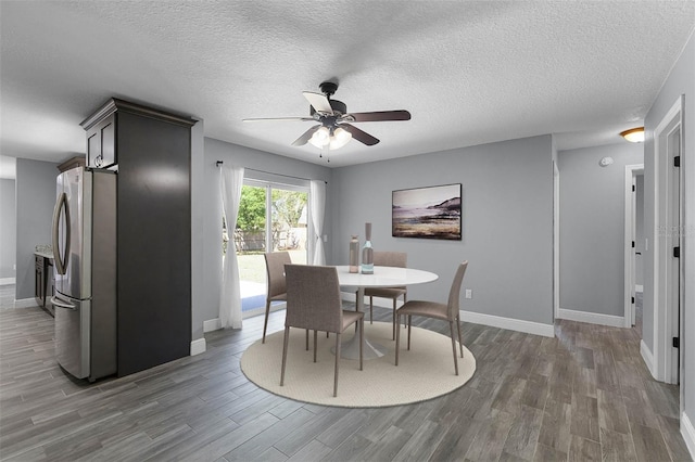 607 Wavecrest Dr, Orlando, FL 32807 - dining space featuring baseboards, ceiling fan, and wood finished floors
