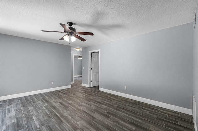607 Wavecrest Dr, Orlando, FL 32807 - spare room featuring dark wood-style flooring, a textured ceiling, baseboards, and ceiling fan