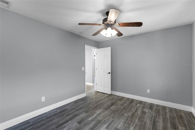607 Wavecrest Dr, Orlando, FL 32807 - empty room featuring a ceiling fan, wood tiled floor, baseboards, and visible vents