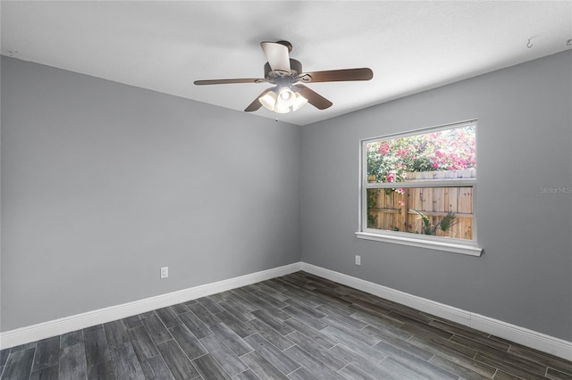 607 Wavecrest Dr, Orlando, FL 32807 - empty room with baseboards, dark wood-type flooring, and a ceiling fan