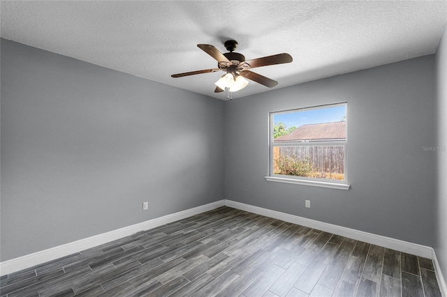 607 Wavecrest Dr, Orlando, FL 32807 - unfurnished room featuring baseboards, ceiling fan, dark wood-type flooring, and a textured ceiling
