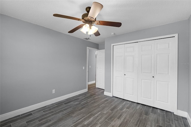 607 Wavecrest Dr, Orlando, FL 32807 - unfurnished bedroom featuring a closet, dark wood-style floors, baseboards, visible vents, and ceiling fan