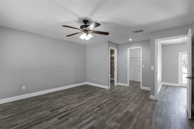 607 Wavecrest Dr, Orlando, FL 32807 - unfurnished room with a ceiling fan, dark wood-style floors, baseboards, and visible vents