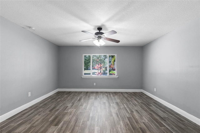 607 Wavecrest Dr, Orlando, FL 32807 - unfurnished room with dark wood-style flooring, a textured ceiling, baseboards, and ceiling fan