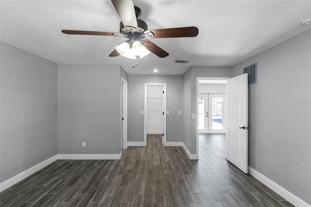 607 Wavecrest Dr, Orlando, FL 32807 - unfurnished room featuring dark wood-style floors, visible vents, and a ceiling fan