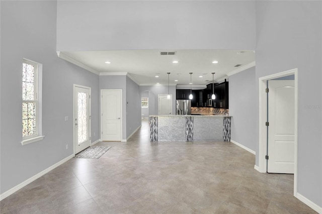 unfurnished living room with ornamental molding, visible vents, baseboards, and recessed lighting