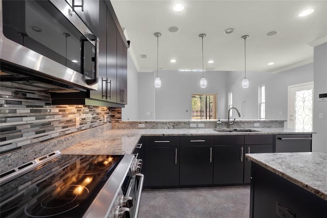 kitchen with ornamental molding, light stone counters, a sink, stainless steel appliances, and backsplash