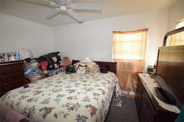 2220 Ave F NW, Winter Haven, FL 33880 - bedroom featuring a ceiling fan and dark colored carpet