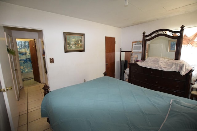 2220 Ave F NW, Winter Haven, FL 33880 - bedroom featuring tile patterned flooring and a wall unit AC