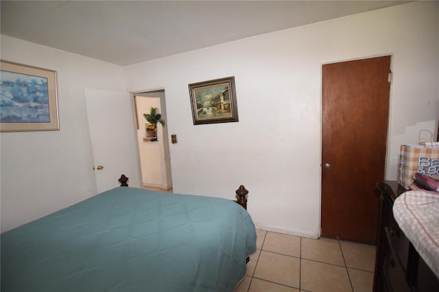 2220 Ave F NW, Winter Haven, FL 33880 - bedroom featuring light tile patterned floors