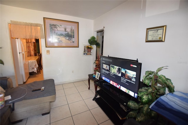 2220 Ave F NW, Winter Haven, FL 33880 - living room with light tile patterned floors and baseboards