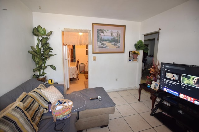 2220 Ave F NW, Winter Haven, FL 33880 - living room with baseboards and light tile patterned flooring