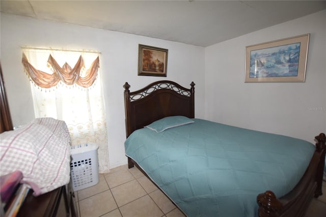 2220 Ave F NW, Winter Haven, FL 33880 - bedroom featuring light tile patterned floors and baseboards