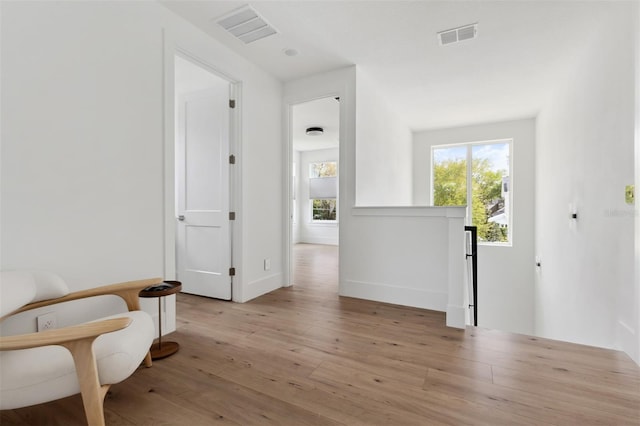 2408 Lafayette Ave, Winter Park, FL 32789 - entryway with baseboards, visible vents, and light wood-style flooring