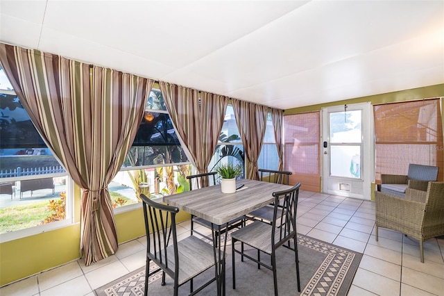 dining space with light tile patterned flooring