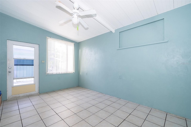 unfurnished room with vaulted ceiling, ceiling fan, and a healthy amount of sunlight