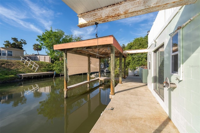dock area featuring a water view