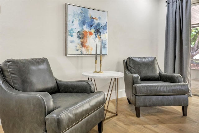 living area with wood finished floors