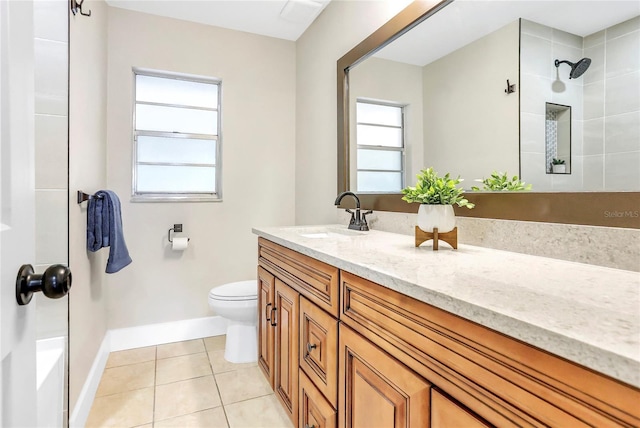 full bathroom featuring tile patterned flooring, vanity, toilet, and a healthy amount of sunlight