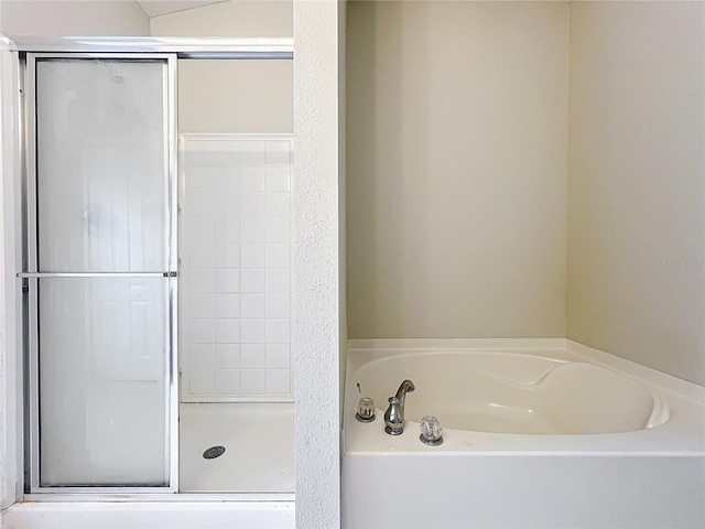 10852 Spider Lily Dr Unit S, Orlando, FL 32832 - full bathroom featuring a garden tub and a stall shower
