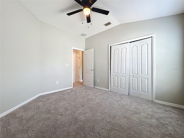 10852 Spider Lily Dr Unit S, Orlando, FL 32832 - unfurnished bedroom with vaulted ceiling, carpet floors, baseboards, a closet, and a ceiling fan
