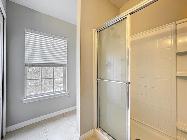 10852 Spider Lily Dr Unit S, Orlando, FL 32832 - bathroom featuring a shower stall, tile patterned floors, and baseboards