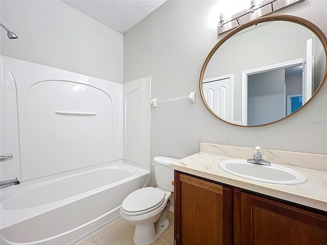 10852 Spider Lily Dr Unit S, Orlando, FL 32832 - full bathroom featuring toilet, tile patterned flooring, vanity, shower / bath combination, and a textured ceiling