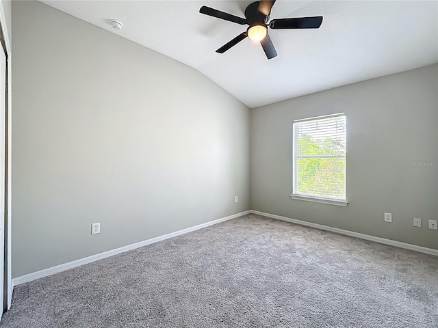 10852 Spider Lily Dr Unit S, Orlando, FL 32832 - empty room featuring lofted ceiling, ceiling fan, baseboards, and carpet